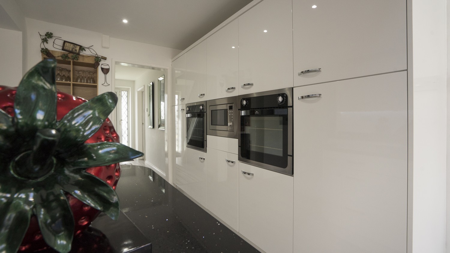 Floor to ceiling feature cupboards with integrated appliances, Kirkby Liverpool.
