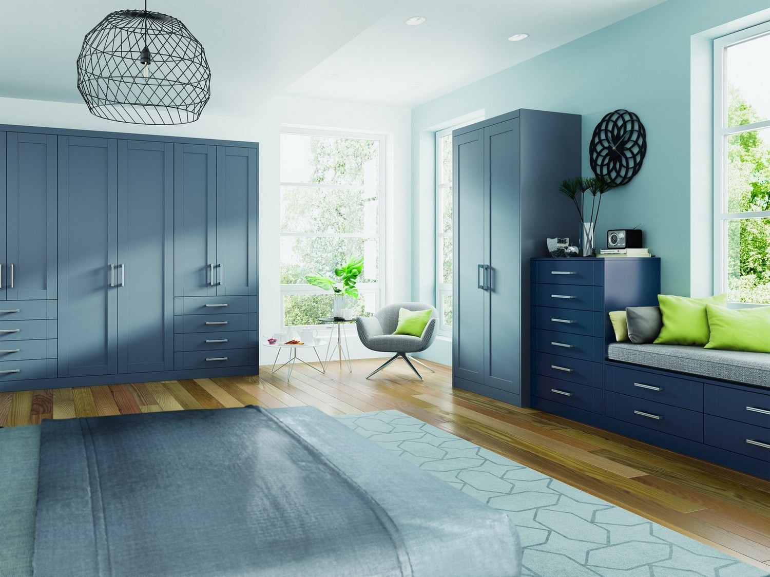 Midnight blue shaker bedroom furniture with integrated seating area designed for our clients in Aughton. Various sized wardrobes and draw sets have been used within this kitchen design giving various types of storage.