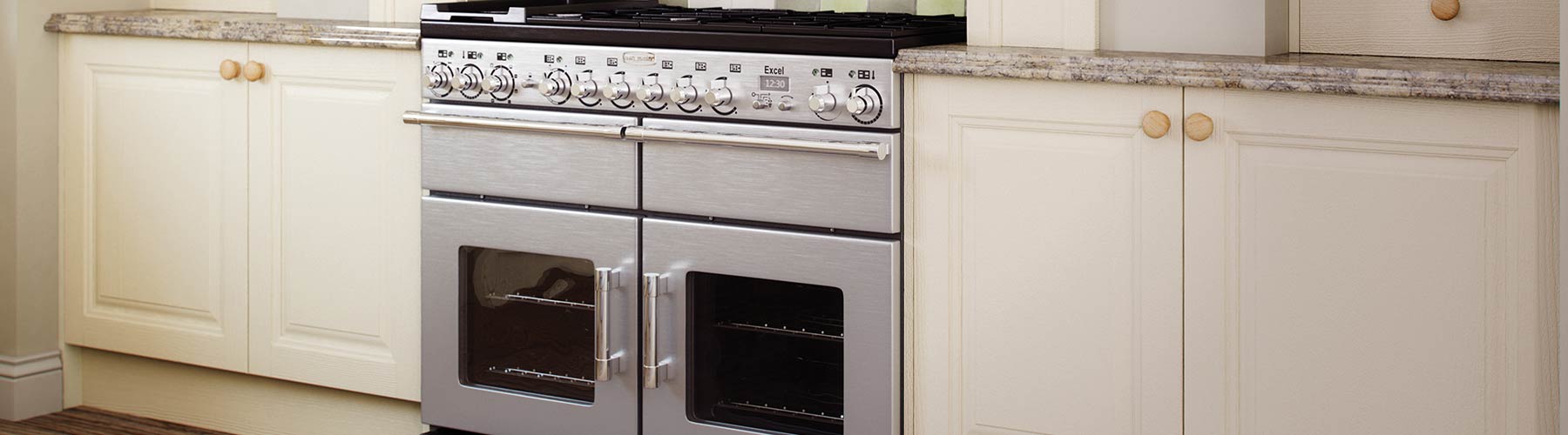 Cream raised panel doors and granite worktop kitchen, from our classic range.