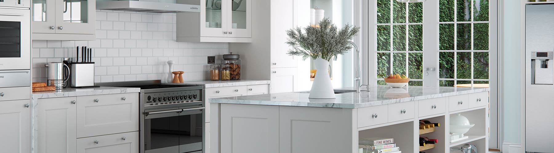 Stunning light grey kitchen with marble grained worktops and chrome hardware.