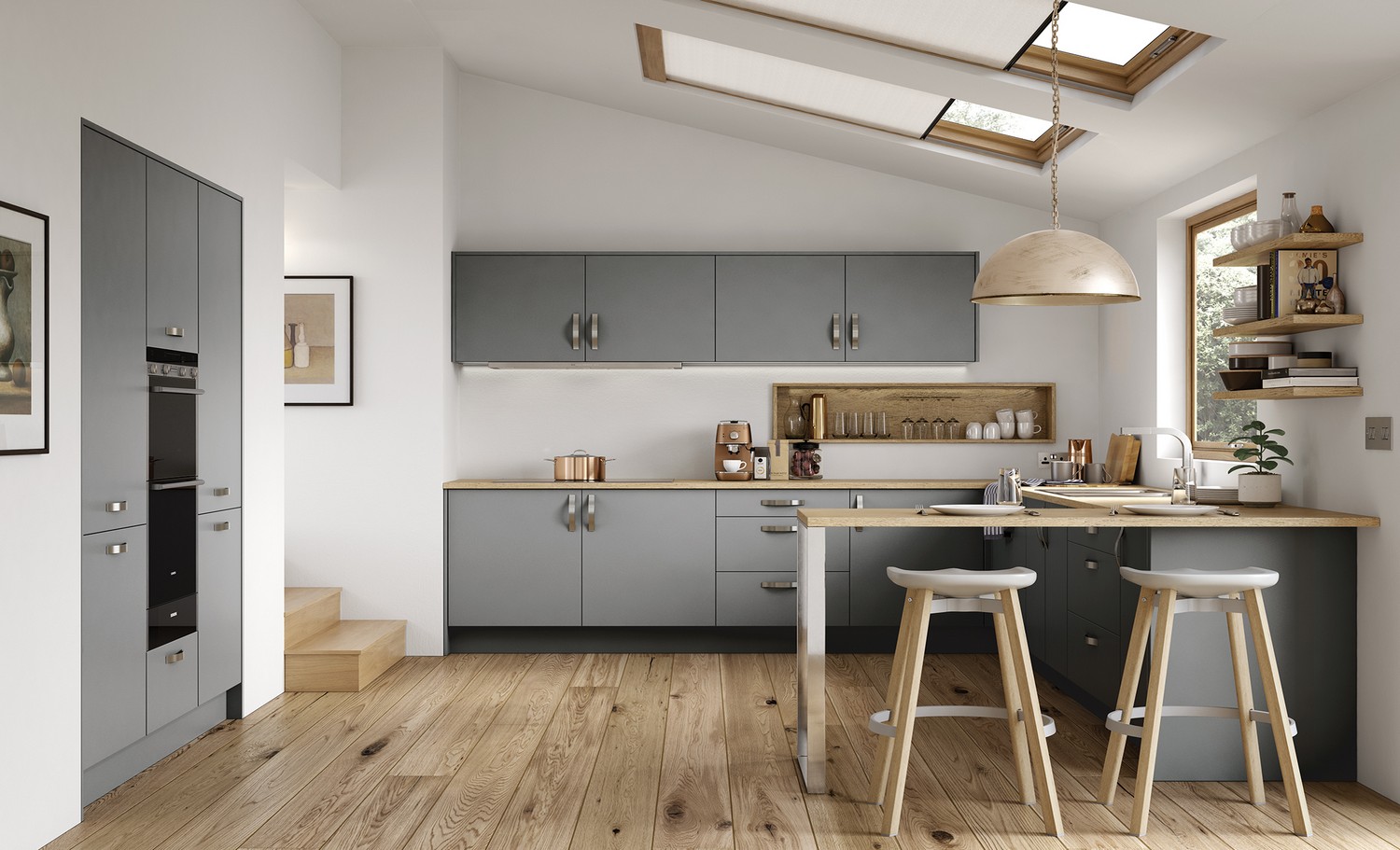 A simple grey slab door with a unique double height oven and large stainless-steel handles have been used here to create a quirky kitchen for our client’s new rear extension in Kirkby, Liverpool. The kitchen doors have a matt finish combined with a wooden worktop achieve a modern edgy look. The kitchen worktops have been extended past the lower cupboards to give a seating area ideal for serving food and entertaining company while cooking. The ceramic cooking hob has been integrated into the worktop and the extraction fan has been hidden within the cupboard above. 