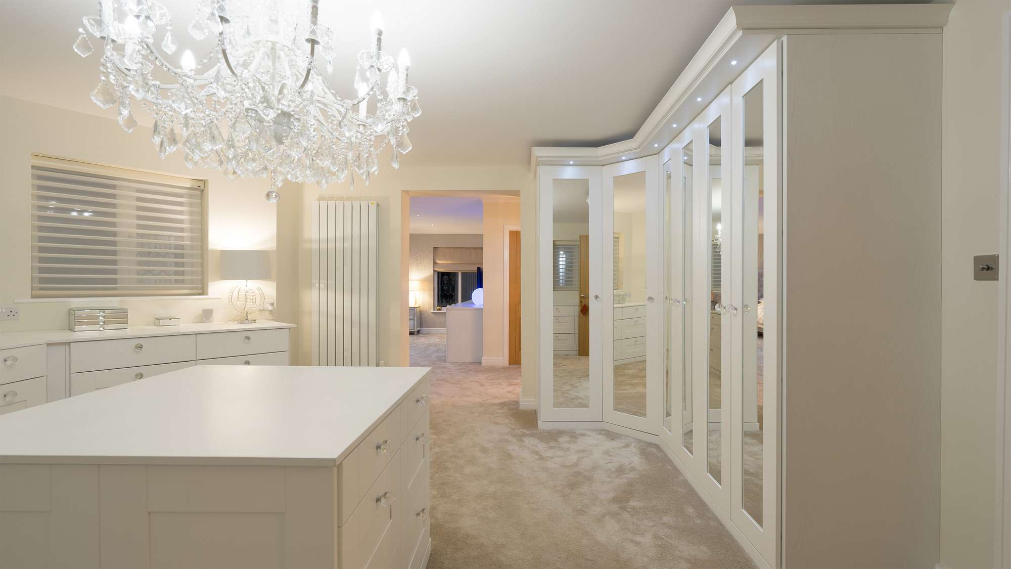 Fitted Bedroom furniture Livrpool, featuring mirrored wardrobes, shaker doors and fitted drawer units.