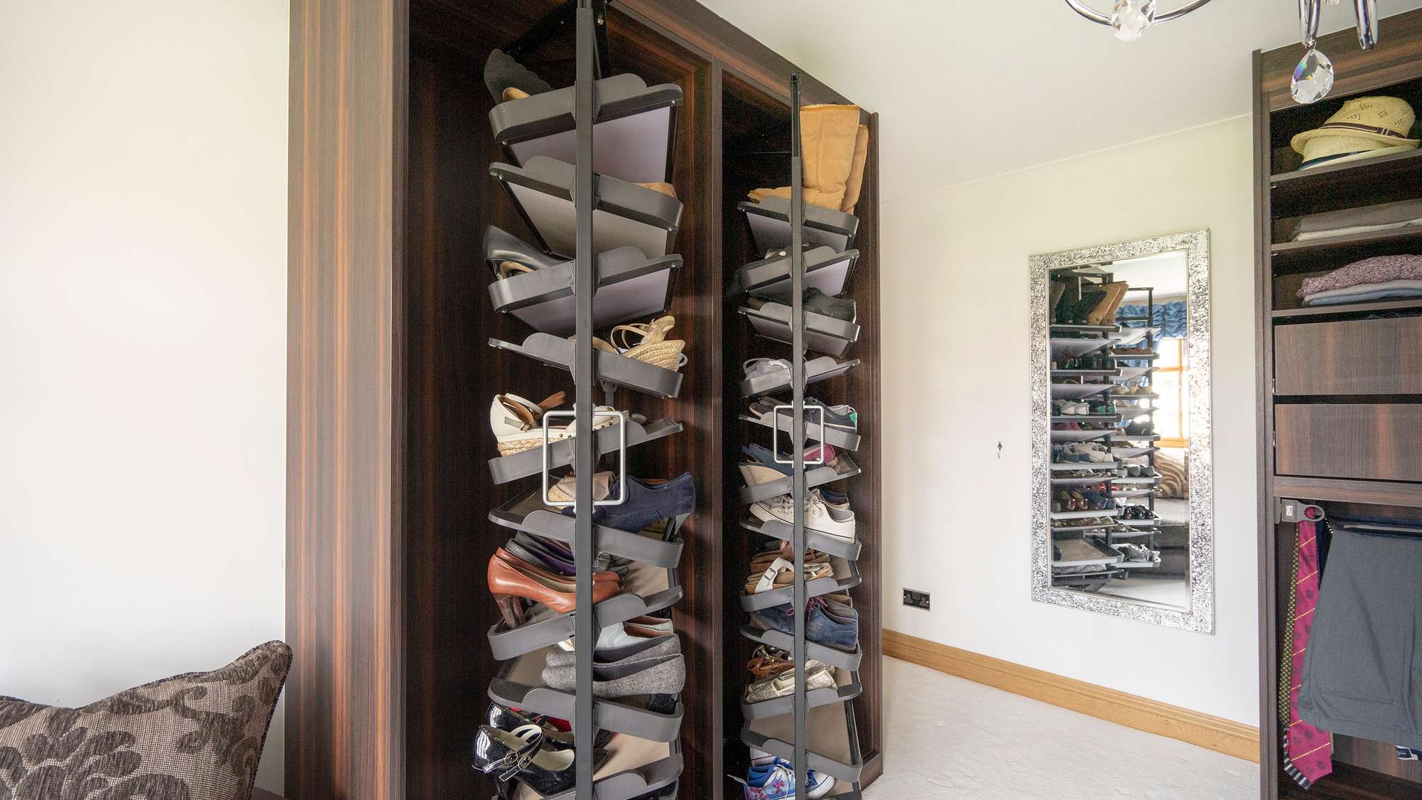 Detail shot of the rotating shoe racks in action.